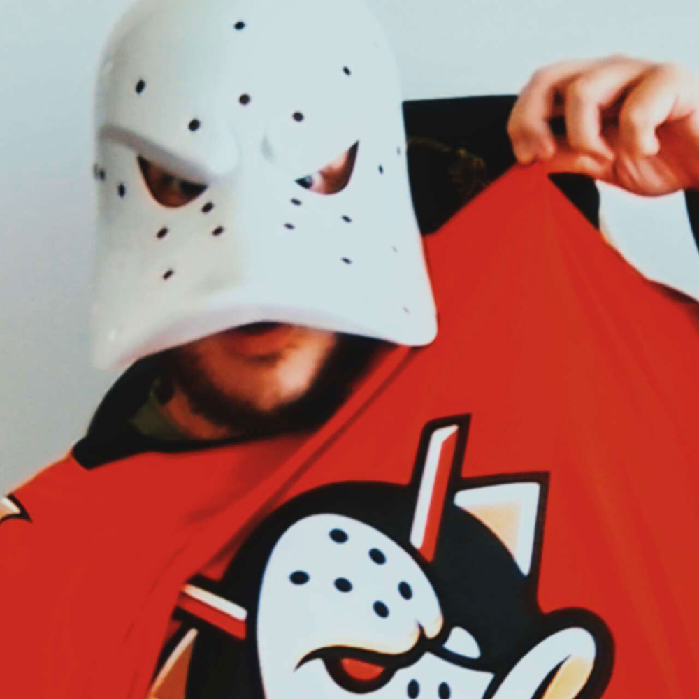 Me dressed up, wearing my Anaheim Ducks Jersey and Ducks Mask!